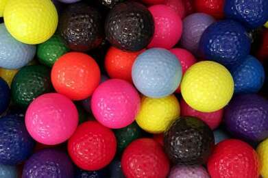 basket of golf balls